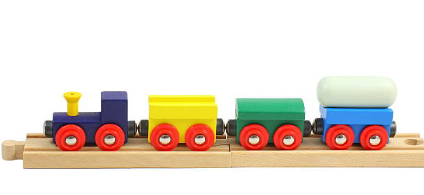 istock Wooden train toy on rails isolated over white 156999377