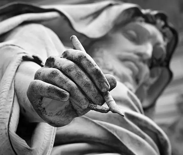 Rome - Detail of st. John the Evangelist statue in the atrium of st. Paul s basilica. March 21, 2012 in Rome, Italy