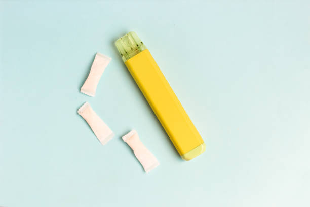 istock Nicotine pads snus, cigarette replacement, together with an electronic cigarette 1570010179