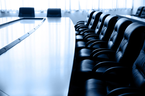 Conference table and chairs in meeting room 