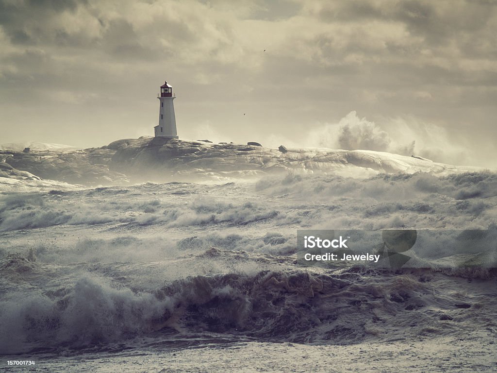 Rough Seas Hurricane surf crashes on the rocks at Peggy's Cove Sea Stock Photo