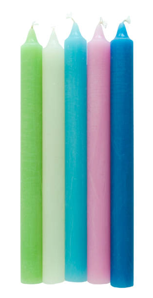 istock Coloured candles on a white background. Vertical photography. 1570033328