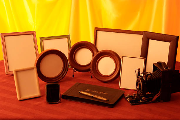 istock Sepia toned image of blank picture frame on wooden table 157008804