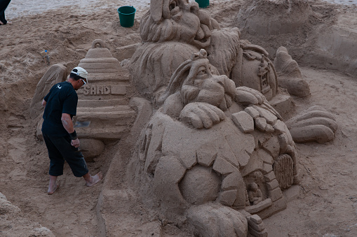 Canne France - April 29 2011; Intricate and detailed sand sculpture in making on Cannes Beach