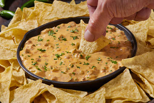 Deluxe Queso dip with Spicy Ground Beef, Jalapeno's and Tortilla Chips