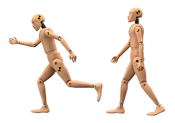 Crash test dummies walking and running on white background Crash test dummies isolated with clipping paths crash test dummy stock pictures, royalty-free photos & images