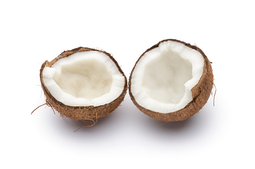 Two half of coconut isolated on white background