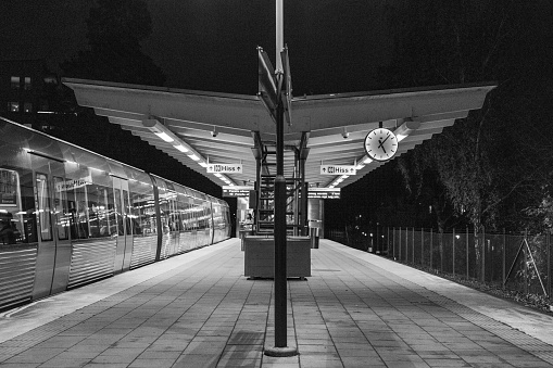 Stockholm south area. Open sky metro station at night.