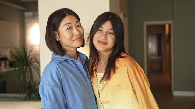 Portrait video of a mother and her daughter