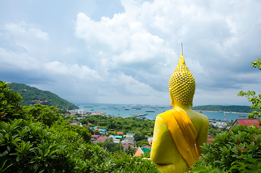 Panorama of Ko Sichang from viewpoint of  big golden thai buddha at Tham Chakkaphong Sangha Monastery on island Ko Sichang, monastery is quiet isolated place with religious cave below too. Island is in Chonburi province