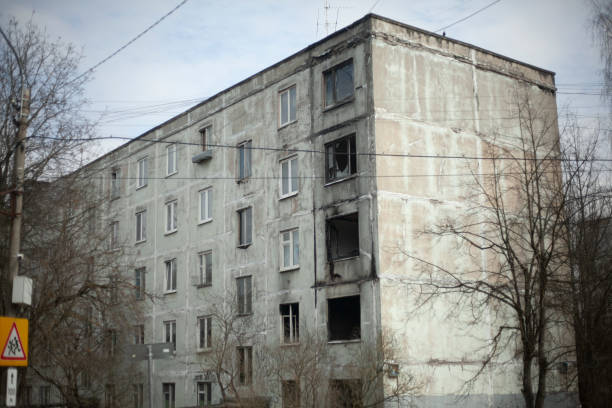 istock Burnt house. After fire in apartment. Old building in city. Broken windows. 1570250310