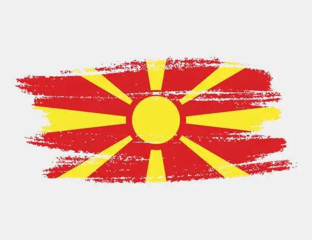 Vector illustration of Artistic grunge brush flag of North Macedonia isolated on white background. Elegant texture of national country flag