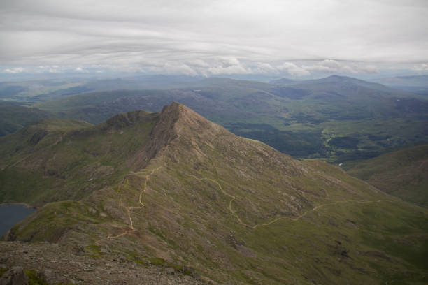 Defocused Beautiful day Nantlle showing valley and Snowdon or Yr Wyddfa in distance. Snowdonia or Eryri National Park, North Wales, UK, landscape