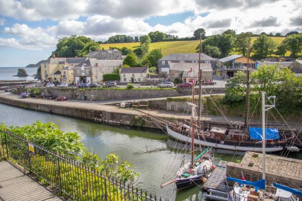 istock Moored boats at Charlestown Harbour, St Austell, Cornwall, UK 1570287099