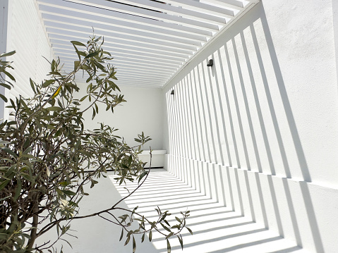 Living house with appartments and balconies in arabian style with sky background. Agadir, Morocco