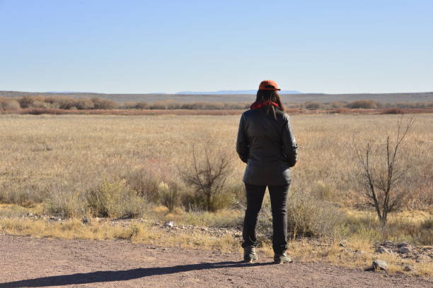 istock Person In Leathe Coat Observing The Horizon 1570322034