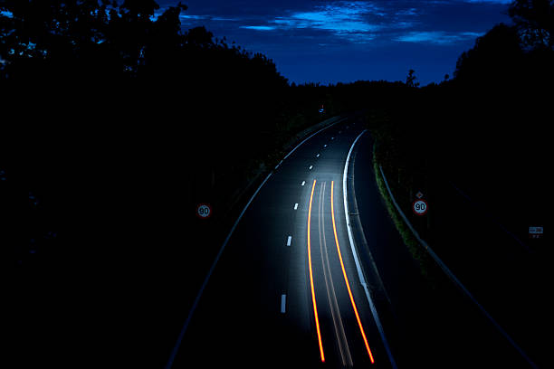 Path light on the road stock photo