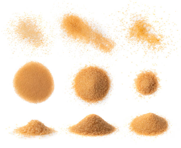istock Raw Brown Cane Sugar Isolated on White Background 1570427224
