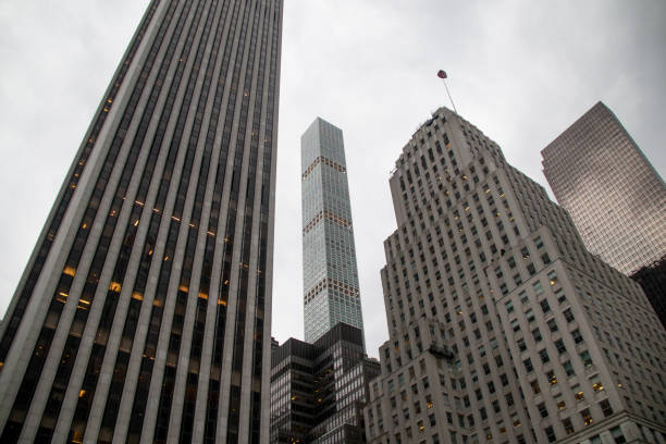 istock Park Avenue building visible between older New York skyscrapers. 1570465392