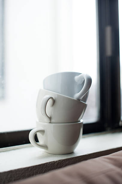 Stacked cappuccino cups stock photo