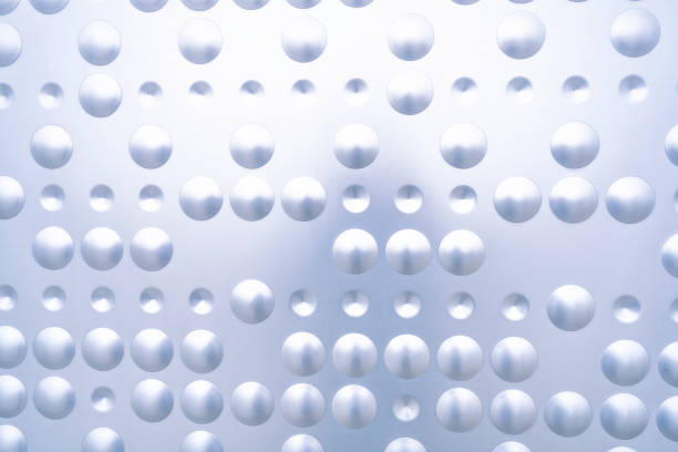 Abstract pattern background of stainless steel panels with modern bumps drops