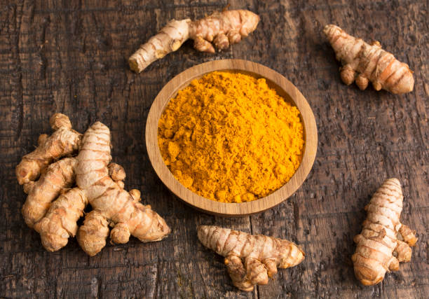 istock Fresh Turmeric Powder - Curcuma longa. 1570480415