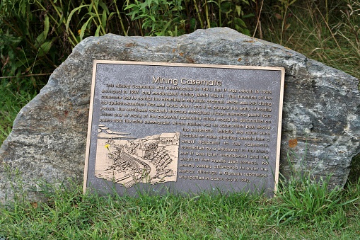 Cape Elizabeth, ME, USA, 9.1.22 - A plaque giving the history of the abandoned mine in Fort Williams Park.