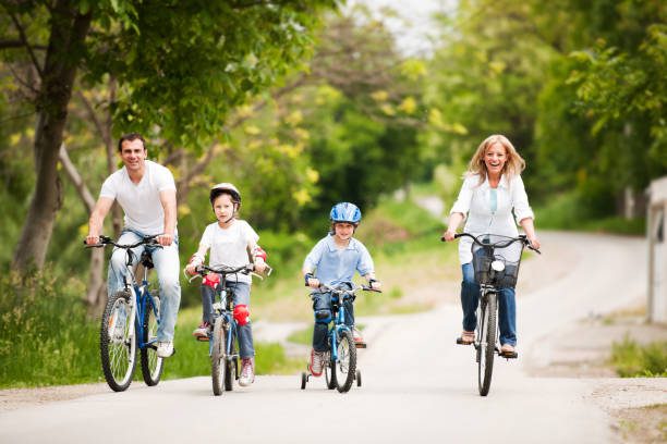 istock Happy family riding bicycle. 157048219