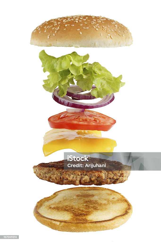 Hamburger ingredients separated in the air Exploded view of burger, isolated on white Food Stock Photo