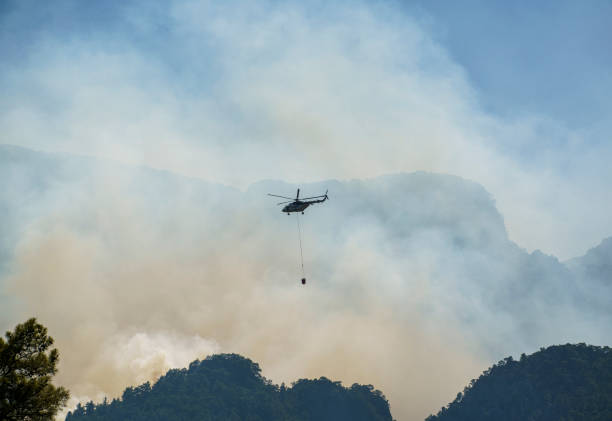 istock Firefighter Helicopter fighting against Kemer Forest Fire, Antalya, Turkiye 1570496750