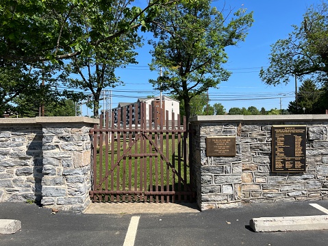 Hershey, PA, USA, 5.29.23 - The front gate and sign that leads to the Derry Presbyterian Church Cemetery.