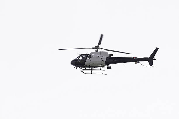 istock Police Helicopter in Motion 157053438