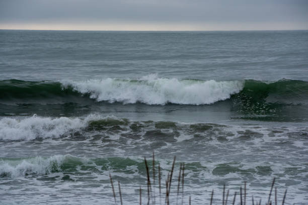 istock Waves crashing on the shore 1570586472