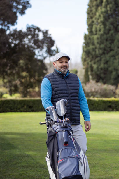 istock Adult man playing golf in autumn 1570587529