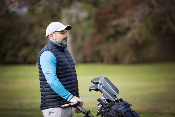 istock Adult man playing golf in autumn 1570588045