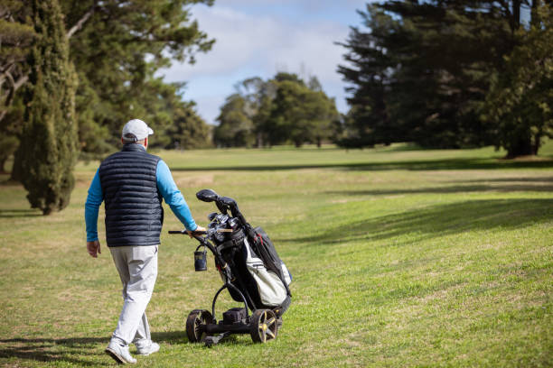 istock Adult man playing golf in autumn 1570591128