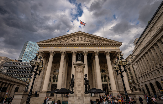 London, UK: The Royal Exchange in the City of London located at Bank junction between Threadneedle Street (L) and Cornhill (R).