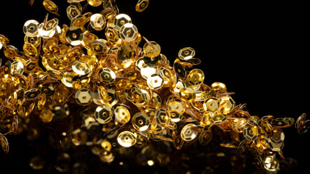 istock Explosion metallic gold glitter sequin sparkle. Golden Glitter sequin spark blink celebrate, blur foil explode in air, fly throw gold particle. Black background isolated, selective focus Blur bokeh 1570657754