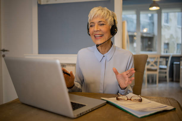 istock Senior woman working from home 1570672644