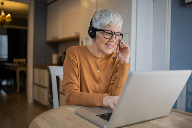 istock Senior woman working from home 1570672657