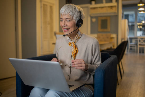 istock Senior woman working from home 1570673193