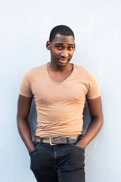 istock cool young African American man leaning against gray background 1570687132