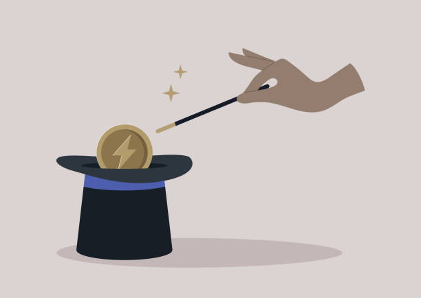 istock A hand doing a trick with a magic wand, a cylinder hat, and a disappearing coin 1570690500
