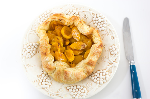 autumn Apple pie with powdered sugar on white background