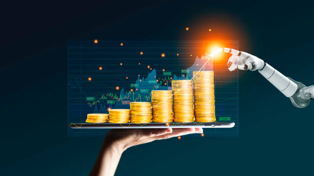 istock Robot trading concept. Robot hand represents use of artificial intelligence in trading stocks. Gold coins are displayed as graphs on smartphone. Digital transformation technology Ai make decisions. 1570726626