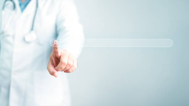 Doctor pressing by finger to find information on virtual search bar with copy space background. Medical assistance and emergency on online internet concept. Website and home page research button