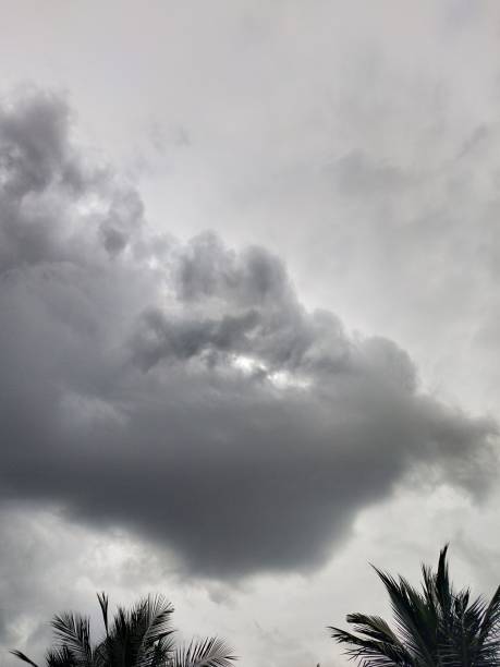 istock Strange eye shape visible in the dark cumulative clouds 1570815277
