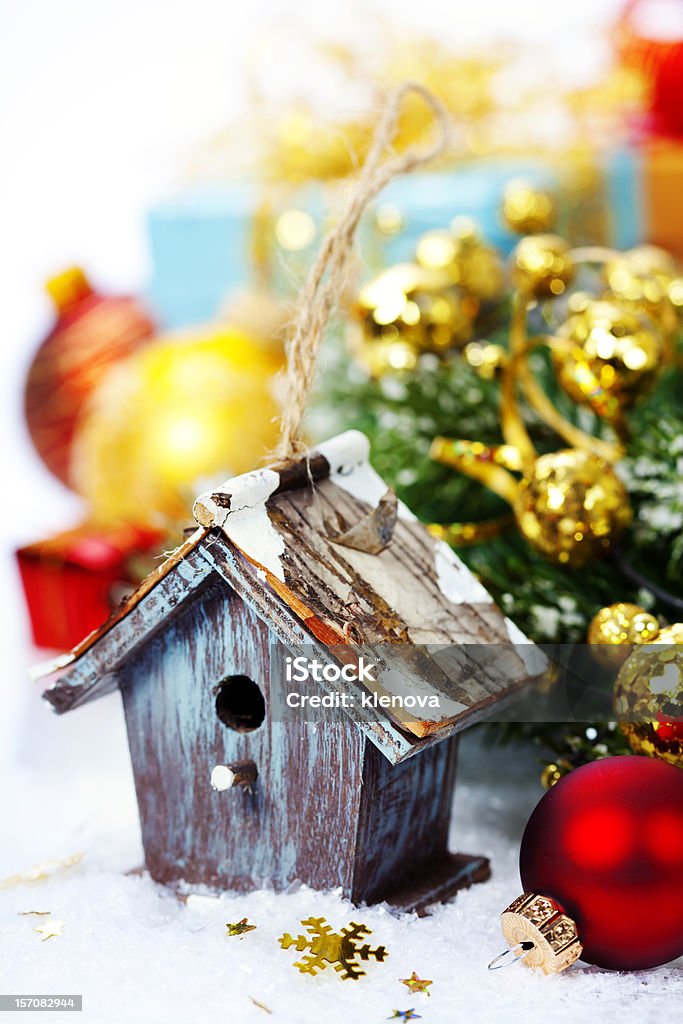 christmas composition Bright christmas composition with small birdhouse Art And Craft Stock Photo