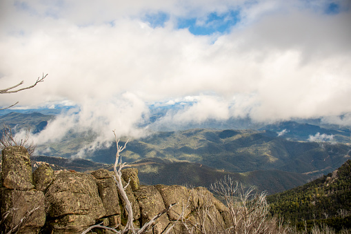Mount Buffalo National Park, Victoria. Australia. Australian Alps views from the Horn picnic area. Mountains and clouds scenic viewlandscape