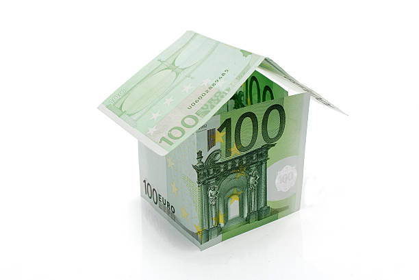istock Hundred euros banknotes house 157087118